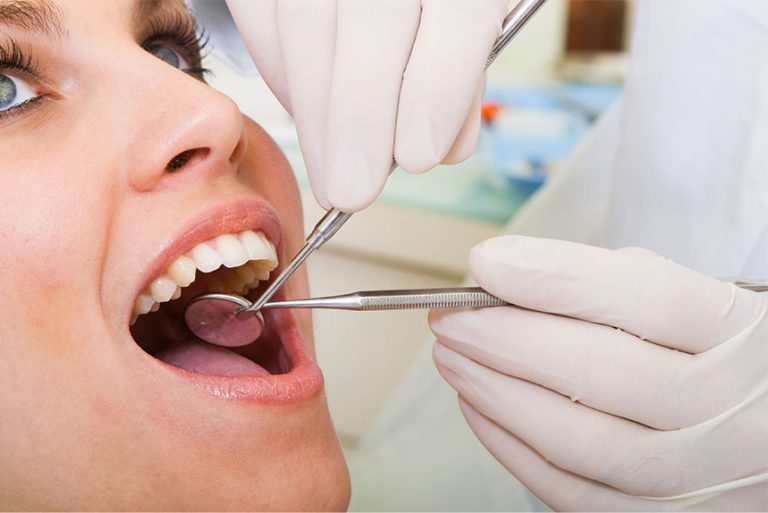 Patient Undergoing Dental Cleaning Procedure in Weyburn, SK