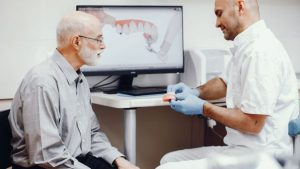 Is a Dental Implant or Dental Bridge Best for Me?